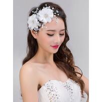 9 kiểu tóc thích hợp nhất với đám cưới ở biển